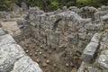 Stone ruins of houses and the street of the ancient city of Phaselis. Royalty Free Stock Photo