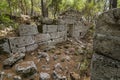 Stone ruins of houses and the street of the ancient city of Phaselis. Royalty Free Stock Photo
