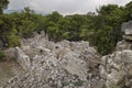 Stone ruins of houses and the street of the ancient city of Phaselis. Royalty Free Stock Photo