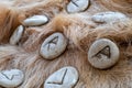 Stone runes on a animal fur. Futhark viking alphabet. Close up photo of Norse runes Royalty Free Stock Photo