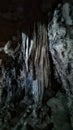 The stone's stalactites drip