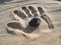 Stone in the Sand Hand