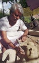 Stone sculptor carving an idol for temple in India Royalty Free Stock Photo