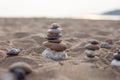 stone sculpture on the beach, beautiful pebble tower Royalty Free Stock Photo