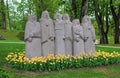 Stone sculpture of a group of women in a city park. Kuldiga. Latvia, May 11, 2019