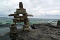 Stone sculpture by the lake