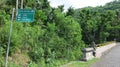 A stone sculpture located at the end of the bridge is designed to protect travelers. Balinese mythology protector statue on Bali i