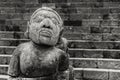 Stone sculpture of man from temple Cetho, Jawa, Indonesia