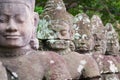 Stone sculptures at the Angkor Thom in Siem Reap, Cambodia.