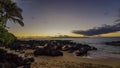 Stone sea shore at sunset