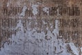 Stone shabby wall with ancient inscriptions Royalty Free Stock Photo