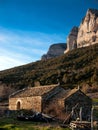 Stone shanty and PeÃÂ±a MontaÃÂ±esa in the Pyrenees.