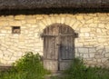 Stone shed under the thatched roof