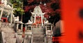 Stone Shinto shrine with Torii gate, statue and peace on travel with spiritual history in Kyoto. Architecture, Japanese Royalty Free Stock Photo