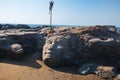 Stone Shiva face on Vagator beach of Goa