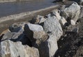 stone shoring on the river bank