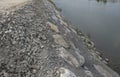 stone shoring on the river bank