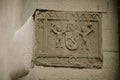 Stone sign on the house, two men with hammers, old town, Medieval street, colorful gothic and renaissance historical buildings, Royalty Free Stock Photo