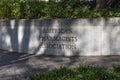 Stone Sign on a Wall Along a Walkway Outside the American Pharmacists Association Headquarters Along Constitution Avenue