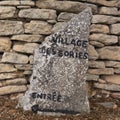 Stone signpost in the Bories Village , France