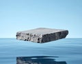 Stone Slab Floating Above Water Surface in a Clear Blue Serene Environment Royalty Free Stock Photo