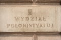 Stone slab with name of Faculty of Polish philology at Jagiellonian University