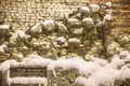 Stone snow under snow. Texture of a stone and snow. Royalty Free Stock Photo