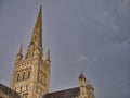 The stone spire of the Norman style Norwich Cathedral, the cathedral church for the Church of England Diocese of Norwich, Norfolk