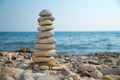 Stone stack on a pebble beach Royalty Free Stock Photo