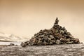 Stone stack and snowy mountains Norway