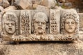 Stone stage masks at Myra Turkey Royalty Free Stock Photo