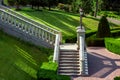 A stone staircase with balustrades railing down into the garden. Royalty Free Stock Photo