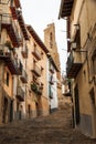 Stone staircase through the buildings in Tortosa, Spain