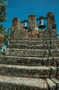 Stone staircase with iron railing and bronze bells Royalty Free Stock Photo