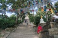 Stone stairs with Buddhist decorations and statues in Nepal capital Kathmandu