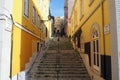 Stone stairs of the colorful street Travessa da Arrochela in the Bairro Alto neighborhood, Lisbon, Portugal Royalty Free Stock Photo