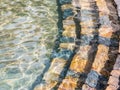 Stone stairs down into the water Royalty Free Stock Photo