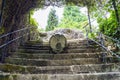 stone stairs with a fountain in the middle and covered with vegetation. Park of the brothers Naveira, betanzos, Galicia, Spain Royalty Free Stock Photo