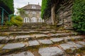 Stone stairs leading to the orangerie of Plas Brondanw, North Wales