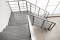 Stone stairs with metal railing indoors Royalty Free Stock Photo