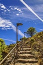 Stone stairs path in nature by mountains Royalty Free Stock Photo