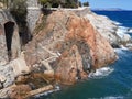 Stone stairs in rock leading down to the sea. Ancient stone steps in the rock. Stairs to the sea. Nature, cliffs and coastline Royalty Free Stock Photo