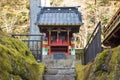 Stone stairs up to a small shrine