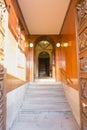 Stone stairs and wooden entrance to a building Royalty Free Stock Photo