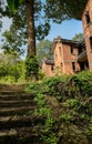 Stone stairway before abandoned 1960s` red brick apartment buildings