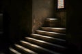 Stone stairway in dark medieval castle dungeon Royalty Free Stock Photo