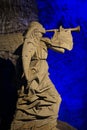 Stone statue of an Angel with a trumpet in unterground Salt Cathedral of Zipaquira, Colombia