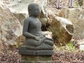 Stone Statue of Buddha in Japanese Garden Royalty Free Stock Photo
