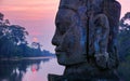 Stone statue on causeway near Gate of Angkor Thom in Siem Reap,