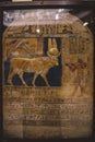 Stone Statue and Golden Painting of Ancient Egyptian Hathor Goddess, illustrated in the form of a cow